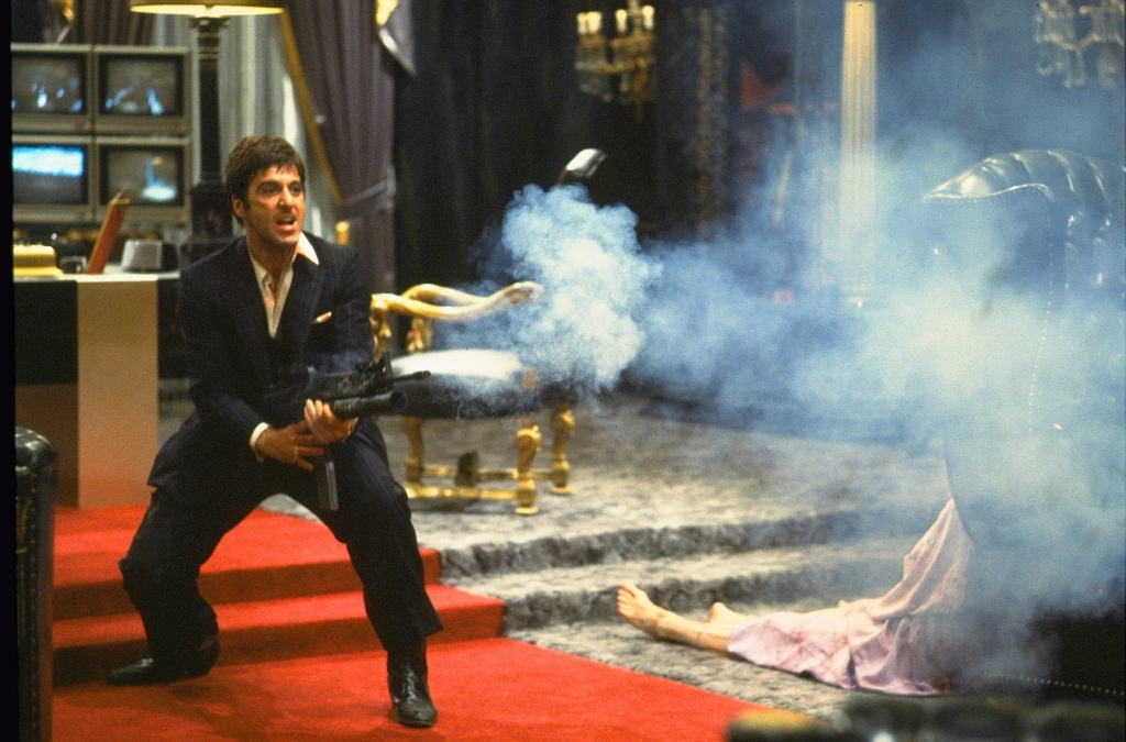 Al Pacino with gun in Scarface.